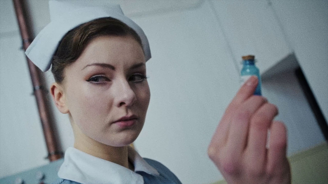A nurse examines a blue vial in In the Grip of Terror